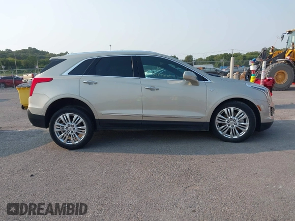 2017 Cadillac XT5 Premium Luxury FWD z VIN 1GYKNCRSXHZ164468, wystawiony jako IAAI lot #40314503 z przebiegiem 94 008 mil mil oraz . Historia ofert i sprzedaży dostępna na DreamBid. Obrazek 13.