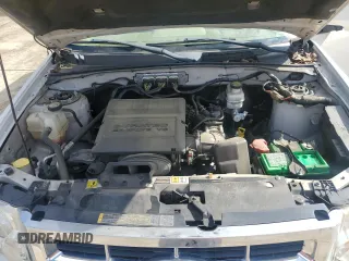2011 Ford Escape Limited z VIN 1FMCU0EG2BKC70972, wystawiony jako Copart lot #58981605 z przebiegiem 120 117 mil mil oraz Szkoda całkowita • Salvage title. Historia ofert i sprzedaży dostępna na DreamBid. Obrazek 11.