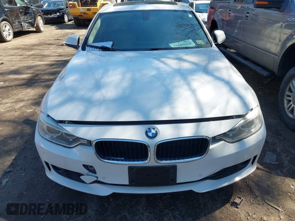 2014 BMW 3 Series 328i xDrive with VIN WBA3B3C55EJ979836, listed as a IAAI auction lot 41886624 with 140,684 mi miles. Bid and sale history available at carsss.com. Image 6.