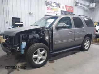 2011 Chevrolet Tahoe LT with VIN 1GNSKBE03BR268246, listed as a IAAI auction lot 41434862 with 250,991 mi miles and . Bid and sale history available at DreamBid. Image 19.