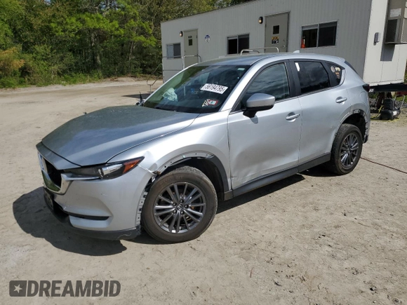 2021 Mazda CX-5 Touring z VIN JM3KFBCM1M0343804, wystawiony jako Copart lot #56194795 z przebiegiem 100 039 mil mil oraz Tytuł czysty. Historia ofert i sprzedaży dostępna na DreamBid. Obrazek 1.