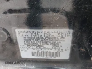 2014 Nissan Versa SV with VIN 3N1CN7AP1EL822984, listed as a IAAI auction lot 42124959 with 126,900 mi miles. Bid and sale history available at carsss.com. Image 9.