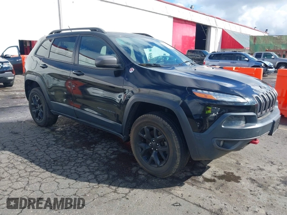 2015 Jeep Cherokee Trailhawk with VIN 1C4PJMBS7FW699392, listed as a IAAI auction lot 41797617 with 1 mi miles. Bid and sale history available at carsss.com. Image 1.