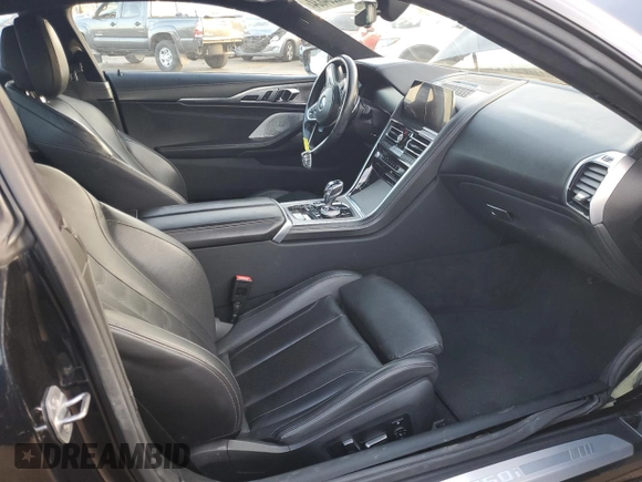 2019 BMW 8 Series M850i xDrive z VIN WBABC4C59KBU96130, wystawiony jako Copart lot #82254834 z przebiegiem Nie podano mil oraz Szkoda całkowita • Salvage title. Historia ofert i sprzedaży dostępna na DreamBid. Obrazek 7.