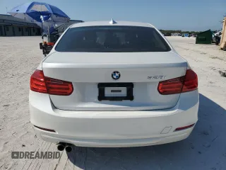 2013 BMW 3 Series 328i z VIN WBA3A5G58DNP26803, wystawiony jako Copart lot #57305995 z przebiegiem 106 590 mil mil oraz Szkoda całkowita • Salvage title. Historia ofert i sprzedaży dostępna na DreamBid. Obrazek 6.