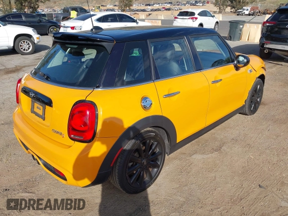 2015 MINI Hardtop 4 Door S z VIN WMWXU3C51F2B57061, wystawiony jako IAAI lot #41691431 z przebiegiem 66 406 mil mil oraz . Historia ofert i sprzedaży dostępna na DreamBid. Obrazek 4.