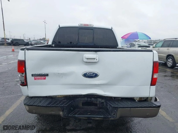 2005 Ford F-150 XLT with VIN 1FTPW12585KC40873, listed as a IAAI auction lot 41580374 with 161,954 mi miles. Bid and sale history available at carsss.com. Image 13.