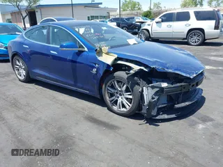 2020 Tesla Model S Long Range with VIN 5YJSA1E25LF396292, listed as a IAAI auction lot 42291374 with 49,634 mi miles and . Bid and sale history available at DreamBid. Image 1.