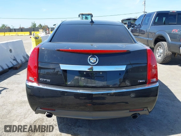 2012 Cadillac CTS Performance z VIN 1G6DJ5E30C0156576, wystawiony jako IAAI lot #42287858 z przebiegiem 106 497 mil mil oraz . Historia ofert i sprzedaży dostępna na DreamBid. Obrazek 17.