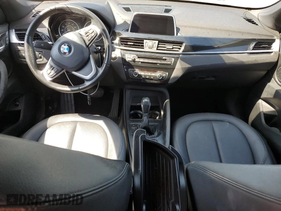 2018 BMW X1 sDrive28i with VIN WBXHU7C38J5H44459, listed as a Copart auction lot 49107553 with 96,494 mi miles and . Bid and sale history available at DreamBid. Image 8.