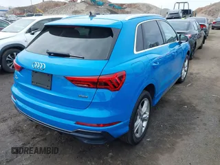2020 Audi Q3 S line Premium z VIN WA1DECF39L1013425, wystawiony jako IAAI lot #41851042 z przebiegiem 57 901 mil mil oraz . Historia ofert i sprzedaży dostępna na DreamBid. Obrazek 4.