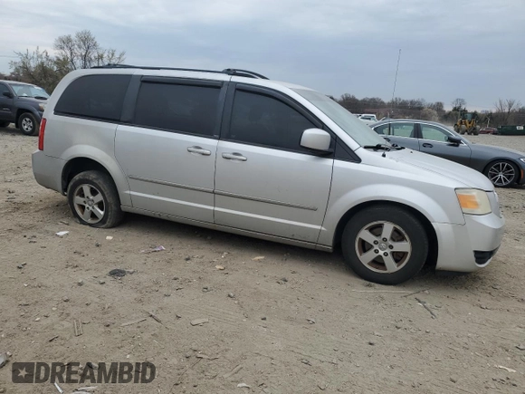 2010 Dodge Grand Caravan SXT with VIN 2D4RN5D14AR118765, listed as a Copart auction lot 50819035 with 162,041 mi miles and Salvage Title. Bid and sale history available at DreamBid. Image 4.