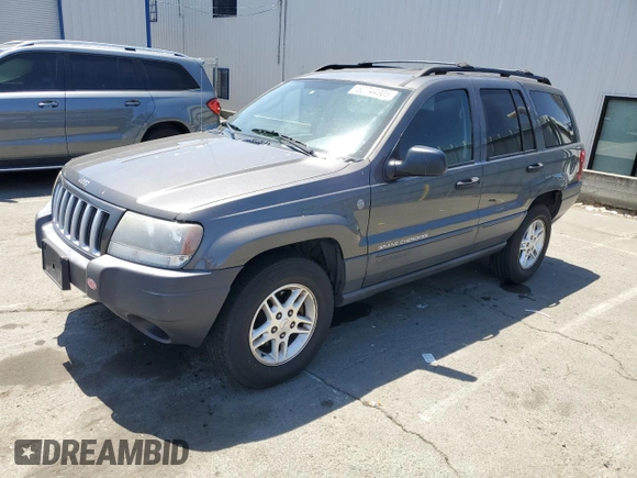 2004 Jeep Grand Cherokee Laredo with VIN 1J4GW48S54C430857, listed as a Copart auction lot 62744305 with 122,099 mi miles and Salvage title. Bid and sale history available at DreamBid. Image 1.