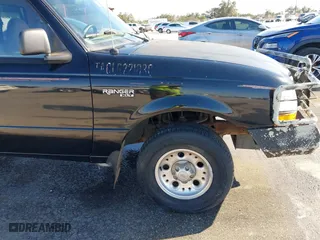 1998 Ford Ranger XL with VIN 1FTYR10C1WPB40423, listed as a IAAI auction lot 41621407 with 122,656 mi miles. Bid and sale history available at carsss.com. Image 18.