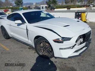 2021 Ford Mustang EcoBoost with VIN 1FA6P8TH0M5155149, listed as a IAAI auction lot 41633534 with 62,314 mi miles. Bid and sale history available at carsss.com. Image 1.