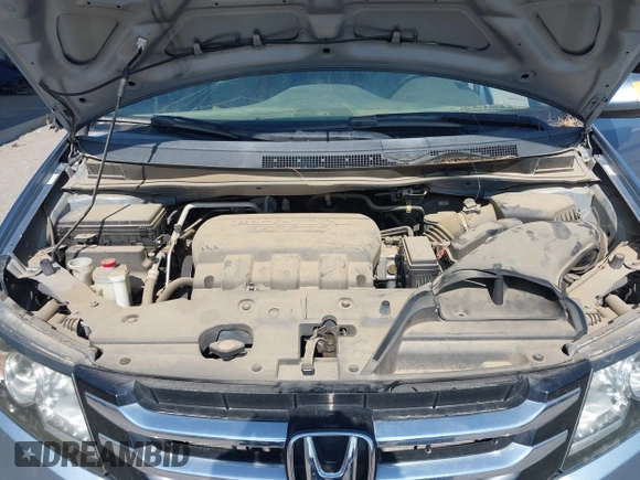 2014 Honda Odyssey EX-L with VIN 5FNRL5H65EB103900, listed as a IAAI auction lot 42592359 with 53,276 mi miles and . Bid and sale history available at DreamBid. Image 10.