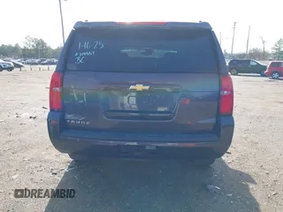 2016 Chevrolet Tahoe LT z VIN 1GNSCBKC3GR238392, wystawiony jako IAAI lot #41443009 z przebiegiem 95 163 mil mil oraz . Historia ofert i sprzedaży dostępna na DreamBid. Obrazek 16.