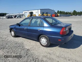 1999 Mitsubishi Mirage DE with VIN JA3AY26AXXU050527, listed as a Copart auction lot 74435914 with 101,224 mi miles and Salvage title. Bid and sale history available at DreamBid. Image 2.