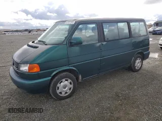 1999 Volkswagen EuroVan с VIN WV2MH8708XH001005, выставлен на аукционе Copart как лот 48987245 с пробегом 210 081 миль миль и Чистый • Clean title. История ставок и продаж доступна на DreamBid. Изображение 1.