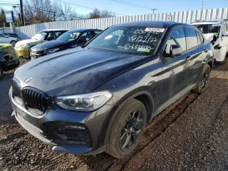 2020 BMW X4 xDrive30i with VIN 5UX2V1C02LLE67937, listed as a Copart auction lot 70302802 with 30,553 mi miles. Bid and sale history available at carsss.com. Image 1.