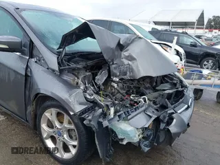 2013 Ford Focus Titanium with VIN 1FADP3J2XDL270393, listed as a IAAI auction lot 41814775 with 76,907 mi miles and . Bid and sale history available at carsss.com. Image 6.