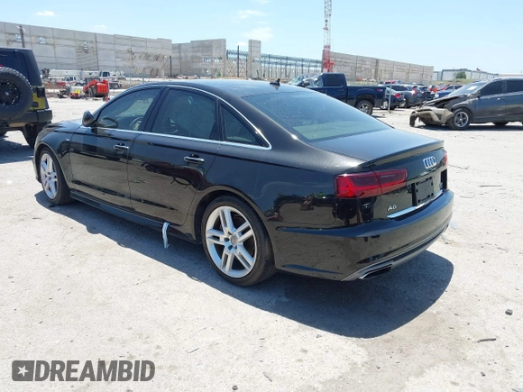 2016 Audi A6 Premium Plus with VIN WAUGFAFC0GN166596, listed as a IAAI auction lot 42526292 with 106,584 mi miles and . Bid and sale history available at DreamBid. Image 3.