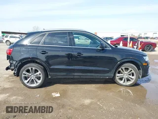 2016 Audi Q3 Premium Plus with VIN WA1EFCFS9GR018740, listed as a IAAI auction lot 41564117 with 38,303 mi miles. Bid and sale history available at carsss.com. Image 14.