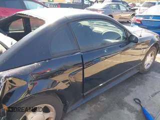 2000 Ford Mustang with VIN 1FAFP4042YF252802, listed as a IAAI auction lot 41994872 with 189,081 mi miles. Bid and sale history available at carsss.com. Image 18.