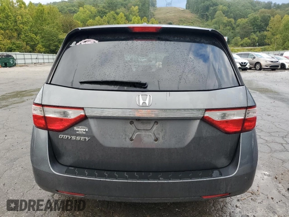 2012 Honda Odyssey EX-L with VIN 5FNRL5H64CB035196, listed as a Copart auction lot 71566704 with 243,529 mi miles and Salvage Title. Bid and sale history available at carsss.com. Image 12.
