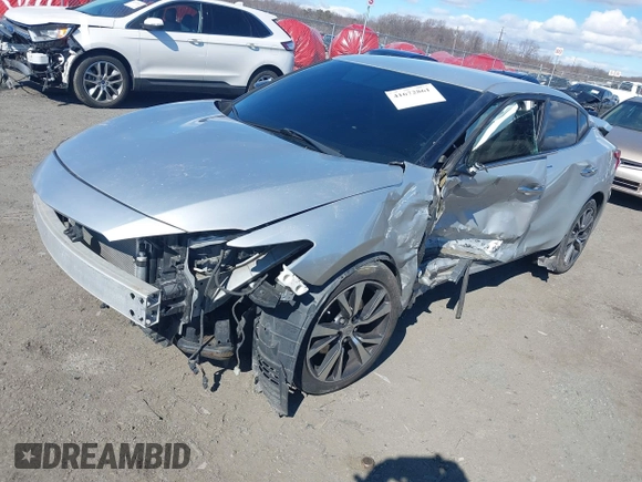 2016 Nissan Maxima SV z VIN 1N4AA6AP4GC446635, wystawiony jako IAAI lot #41672861 z przebiegiem 118 377 mil mil oraz . Historia ofert i sprzedaży dostępna na DreamBid. Obrazek 2.