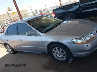2002 Honda Accord SE z VIN JHMCG66892C011913, wystawiony jako IAAI lot #42323509 z przebiegiem 226 288 mil mil oraz . Historia ofert i sprzedaży dostępna na DreamBid. Obrazek 13.