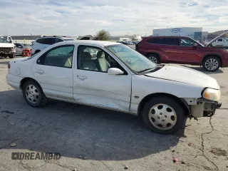 1999 Mercury Mystique GS z VIN 1MEFM653XXK629587, wystawiony jako Copart lot #78900204 z przebiegiem 139 060 mil mil oraz Szkody całkowita. Historia ofert i sprzedaży dostępna na DreamBid. Obrazek 4.