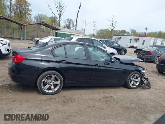 2014 BMW 3 Series 320i xDrive with VIN WBA3C3C59EF984070, listed as a IAAI auction lot 42063569 with 169,002 mi miles and . Bid and sale history available at DreamBid. Image 13.