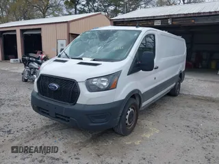 2023 Ford Transit Cargo with VIN 1FTBR1Y85PKA34934, listed as a IAAI auction lot 41768055 with 47,840 mi miles and . Bid and sale history available at DreamBid. Image 2.
