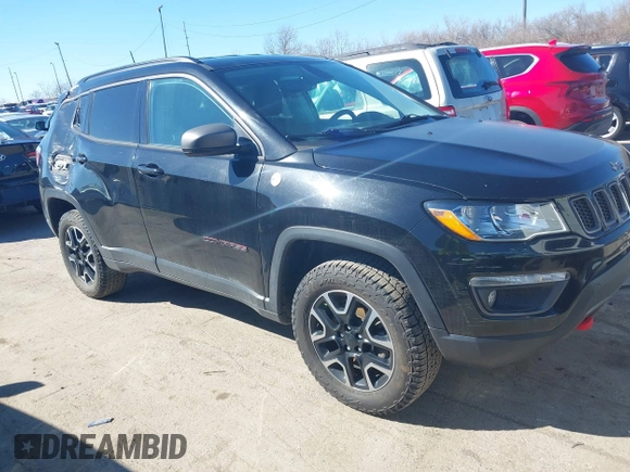 2019 Jeep Compass Trailhawk with VIN 3C4NJDDB1KT671642, listed as a IAAI auction lot 41810138 with 119,029 mi miles and . Bid and sale history available at carsss.com. Image 13.