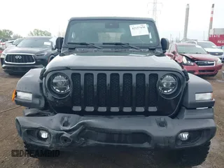 2021 Jeep Wrangler Unlimited Sport S z VIN 1C4HJXDG0MW788779, wystawiony jako IAAI lot #42137430 z przebiegiem 52 903 mil mil oraz . Historia ofert i sprzedaży dostępna na DreamBid. Obrazek 12.