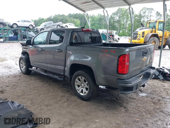 2018 Chevrolet Colorado 4WD LT z VIN 1GCGTCEN6J1146104, wystawiony jako IAAI lot #42338356 z przebiegiem 71 043 mil mil oraz . Historia ofert i sprzedaży dostępna na DreamBid. Obrazek 3.