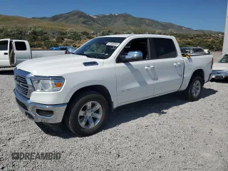 2024 Ram 1500 Laramie with VIN 1C6SRFJT1RN215386, listed as a Copart auction lot 57690585 with 29,564 mi miles and Salvage title. Bid and sale history available at DreamBid. Image 1.