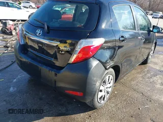 2012 Toyota Yaris L with VIN JTDKTUD31CD500337, listed as a IAAI auction lot 41410723 with 130,881 mi miles. Bid and sale history available at carsss.com. Image 6.