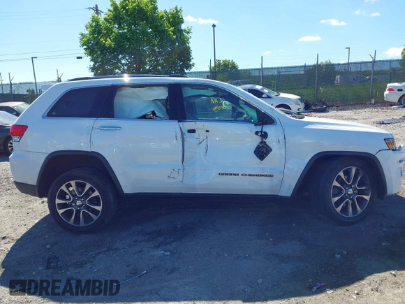 2018 Jeep Grand Cherokee Limited with VIN 1C4RJFBG7JC245931, listed as a IAAI auction lot 42206747 with 100,414 mi miles and . Bid and sale history available at DreamBid. Image 12.