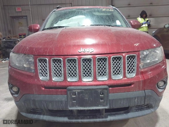 2014 Jeep Compass Latitude with VIN 1C4NJCEB9ED717575, listed as a IAAI auction lot 41532566 with 128,821 mi miles. Bid and sale history available at carsss.com. Image 12.