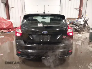 2014 Ford Focus ST with VIN 1FADP3L91EL375674, listed as a IAAI auction lot 41572329 with 100,253 mi miles and . Bid and sale history available at carsss.com. Image 16.