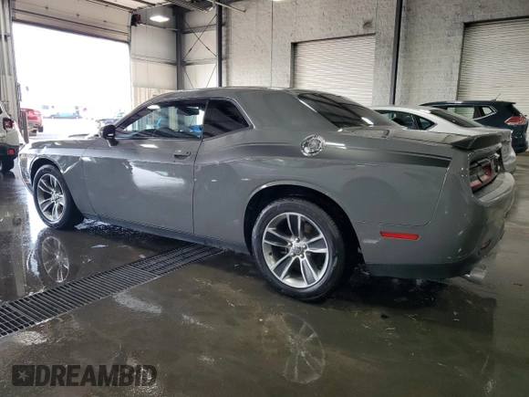 2017 Dodge Challenger SXT z VIN 2C3CDZAG8HH613593, wystawiony jako Copart lot #71003954 z przebiegiem 89 441 mil mil oraz Szkoda całkowita • Salvage title. Historia ofert i sprzedaży dostępna na DreamBid. Obrazek 2.