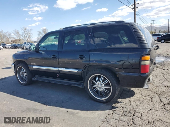 2004 GMC Yukon SLE with VIN 1GKEC13V44R263849, listed as a Copart auction lot 47528325 with 448,294 mi miles and Salvage Title. Bid and sale history available at carsss.com. Image 2.