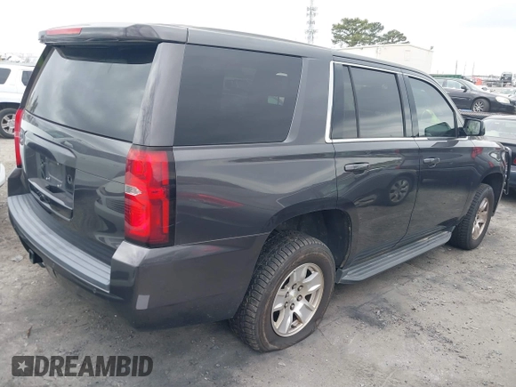2017 Chevrolet Tahoe Commercial with VIN 1GNLCDEC0HR303602, listed as a IAAI auction lot 41718630 with 196,484 mi miles and . Bid and sale history available at DreamBid. Image 4.