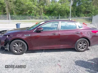 2019 Kia Optima LX z VIN 5XXGT4L38KG320364, wystawiony jako IAAI lot #42150783 z przebiegiem 103 089 mil mil oraz . Historia ofert i sprzedaży dostępna na DreamBid. Obrazek 14.
