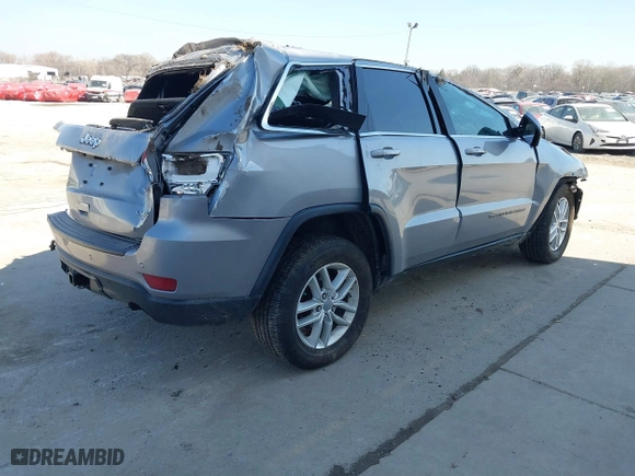 2018 Jeep Grand Cherokee Laredo E with VIN 1C4RJFAG8JC130465, listed as a IAAI auction lot 41789688 with 133,299 mi miles. Bid and sale history available at carsss.com. Image 4.