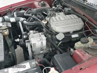 1995 Ford Mustang with VIN 1FALP4447SF232808, listed as a IAAI auction lot 42625098 with 120,920 mi miles and . Bid and sale history available at DreamBid. Image 12.