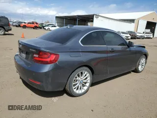 2015 BMW 2 Series 228i with VIN WBA1F9C57FVW98744, listed as a Copart auction lot 50383504 with 68,799 mi miles. Bid and sale history available at carsss.com. Image 3.