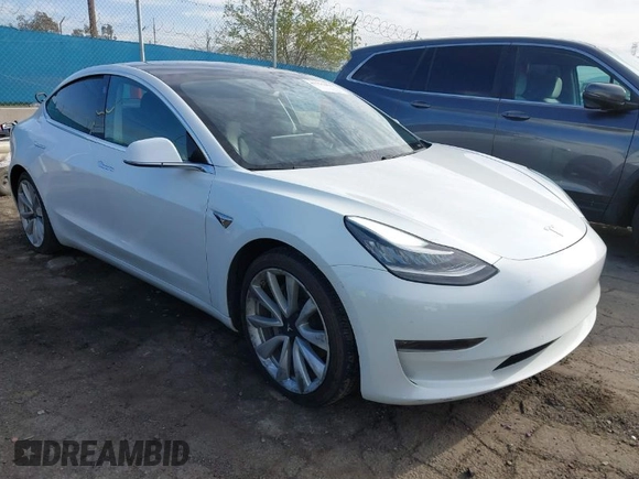 2020 Tesla Model 3 Long Range with VIN 5YJ3E1EB9LF620771, listed as a IAAI auction lot 41795008 with 53,155 mi miles and . Bid and sale history available at DreamBid. Image 1.